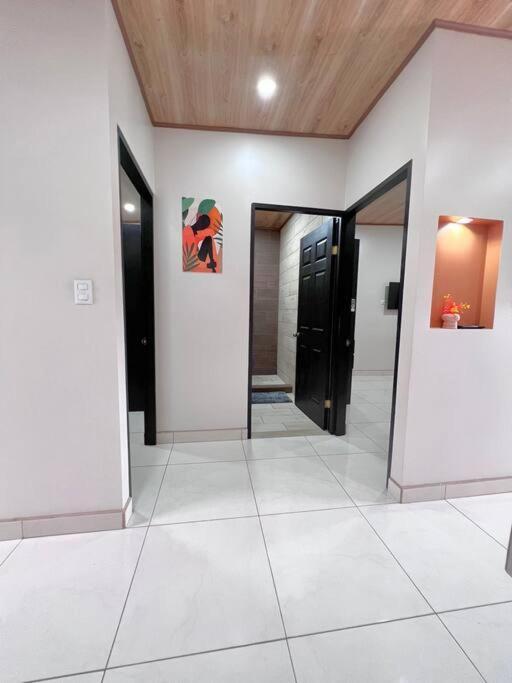 Orange Apartment 5 min aeropuerto Juan santamaria Alajuela Bagian luar foto